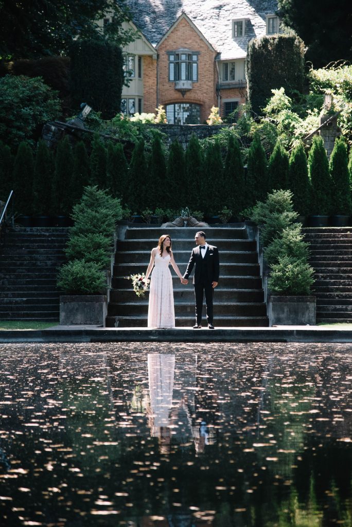 wedding in formal gardens with reflecting pool