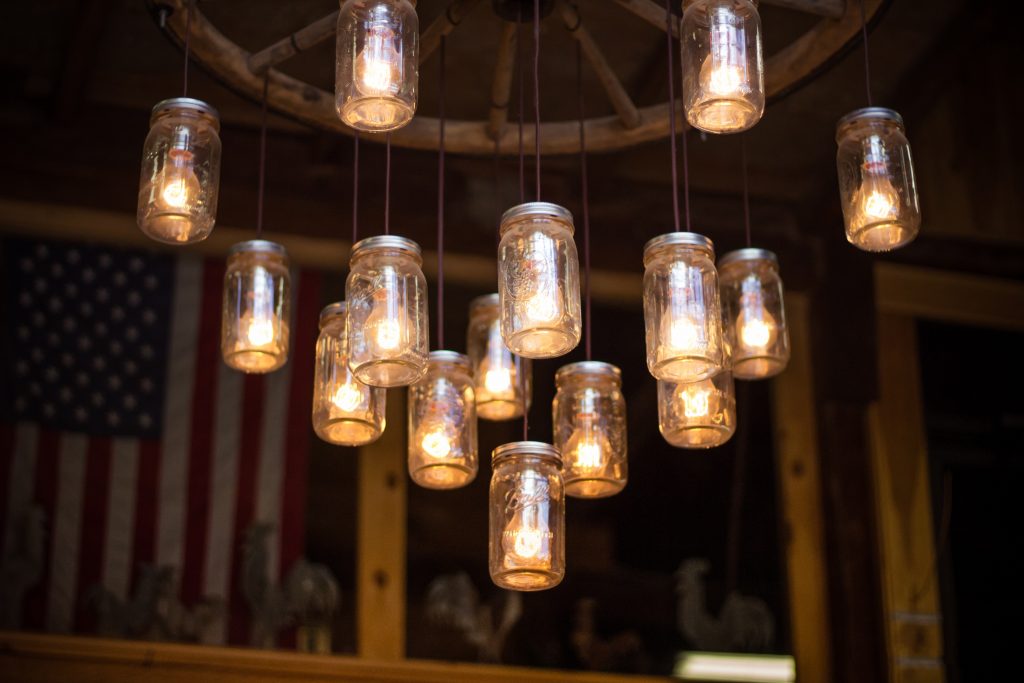 edison bulbs in mason jars, hanging from ceiling