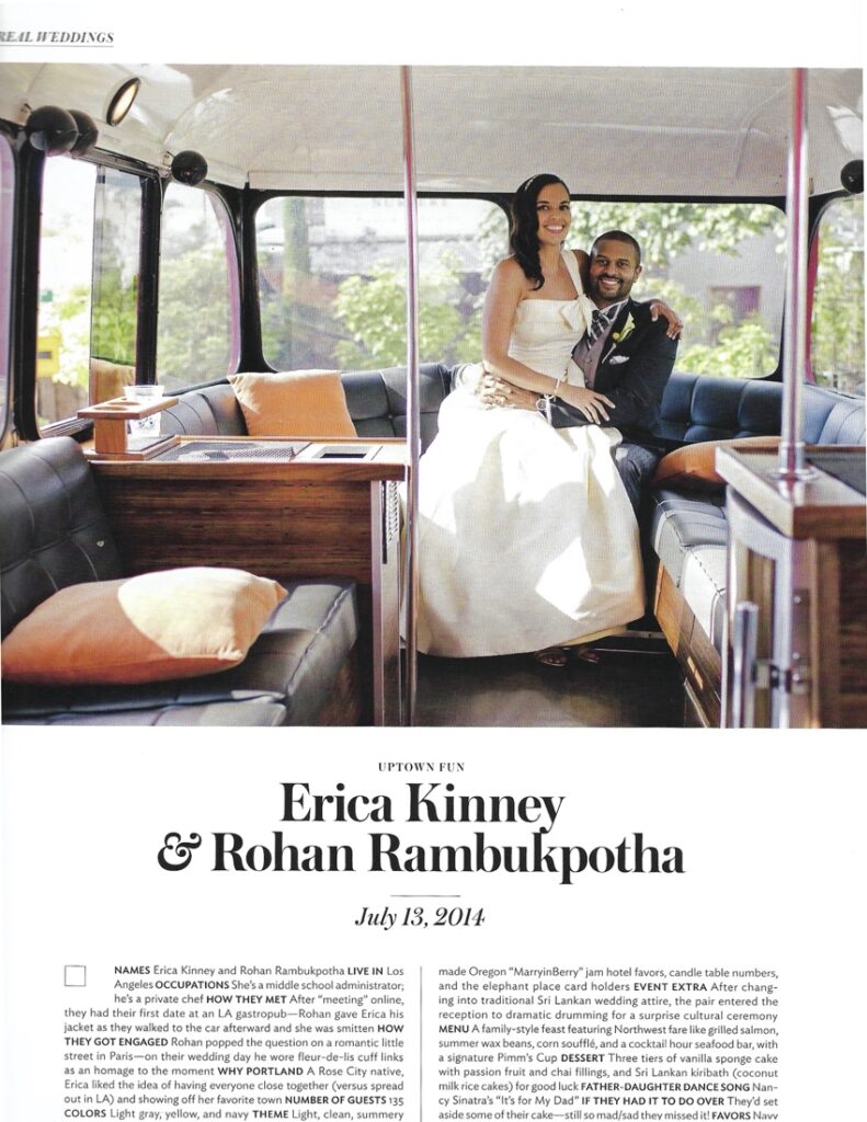 a wedding couple poses together in the window of a double-decker bus